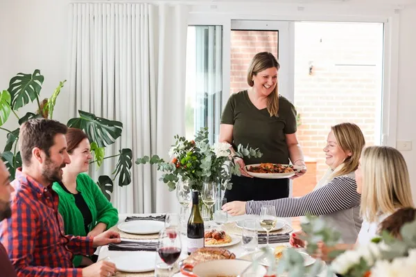 Family dinner being served around the table